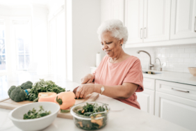 older-woman-preparing-a-salad
